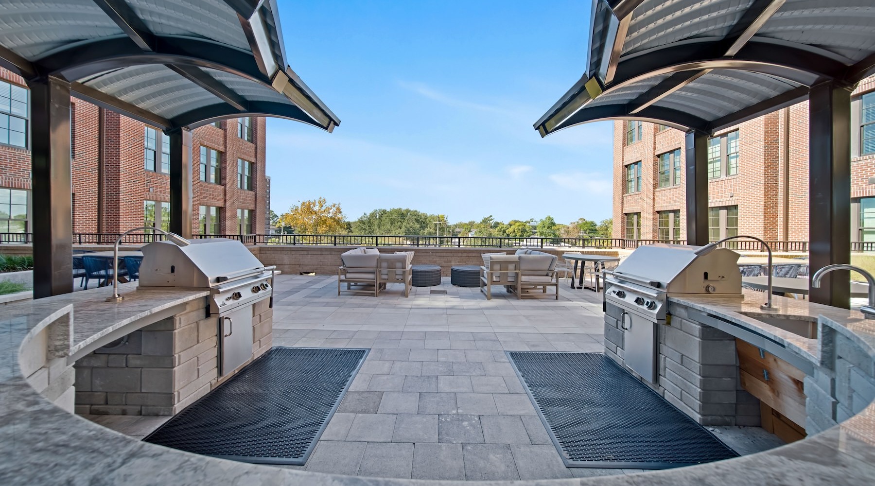 State-of-the-art amenities a grill area in a courtyard