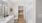 a bathroom with a glass shower, a toilet and a sink