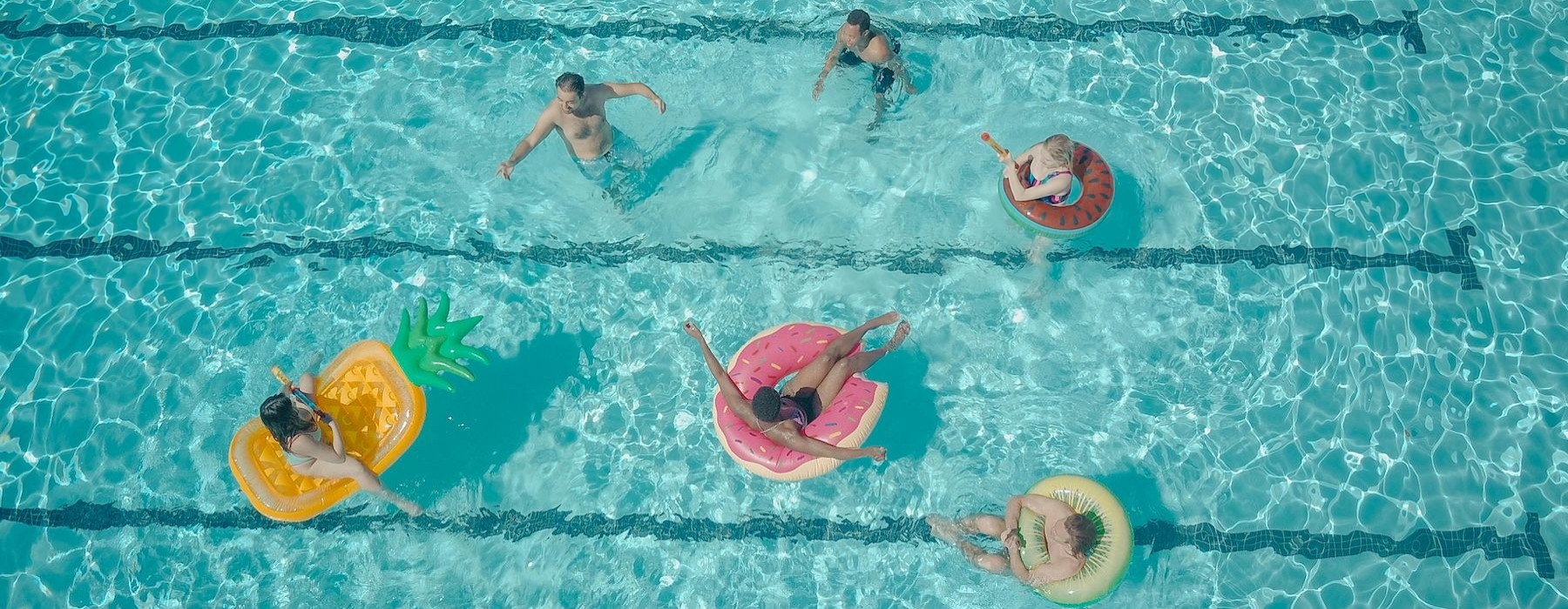 a group of people in a pool